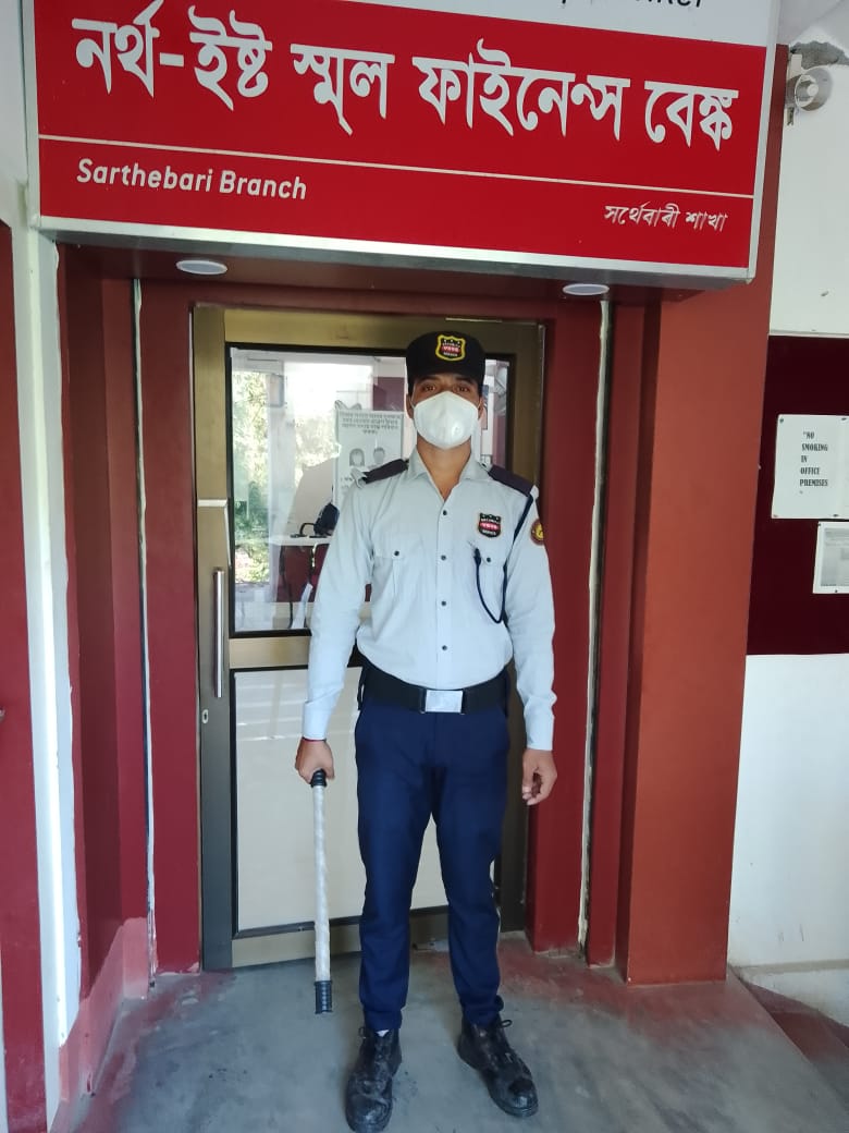 Uniformed security personnel at a site entrance