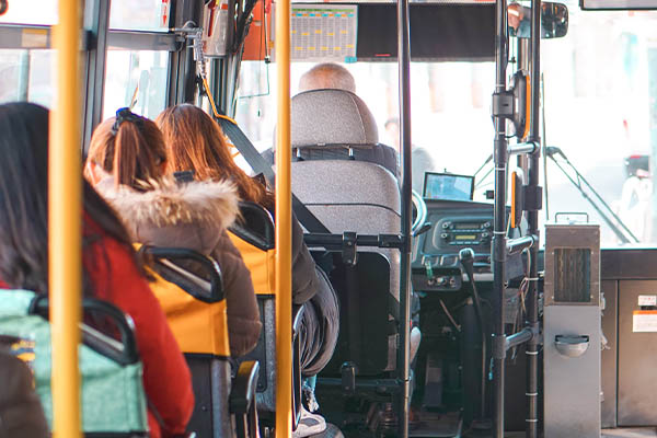 Passenger bus interior illustrating staff transport